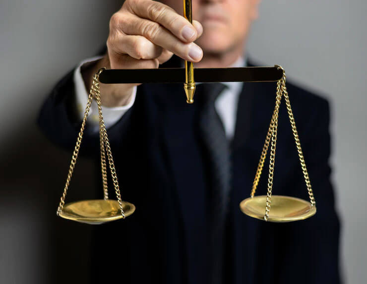 Judge holding the scales of justice